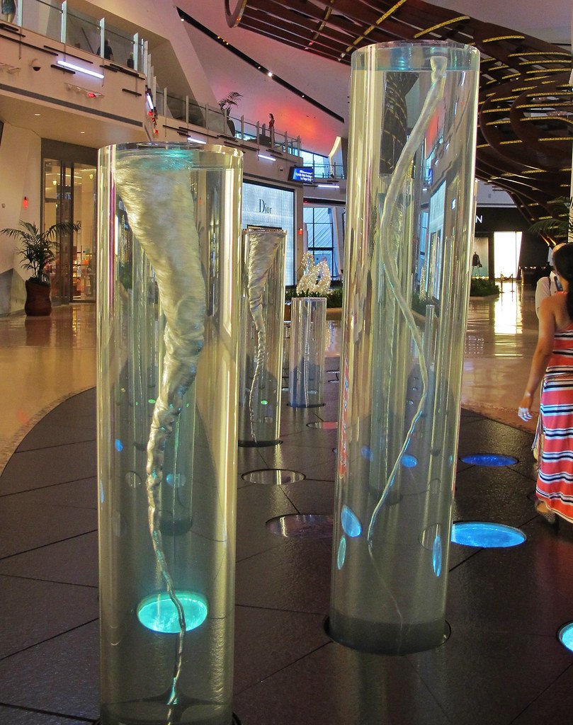 The Halo installation’s transparent water columns and illuminated vortex displays.