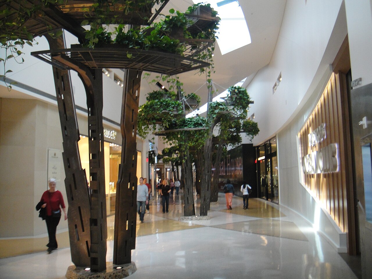Crystals corridor with metal trees holding planters, March 2010; historical Hanging Gardens view.