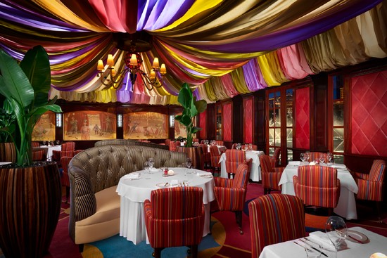 Interior of Le Cirque at Bellagio, with its circus-tent ceiling.
