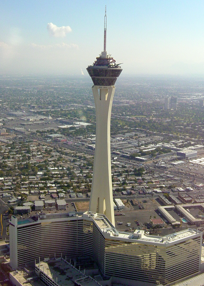 An aerial photograph of the Stratosphere tower, hotel and surrounding city in 2003.
