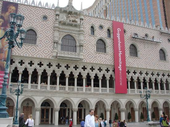 The Venetian’s patterned palace façade, with arched balconies and windows.
