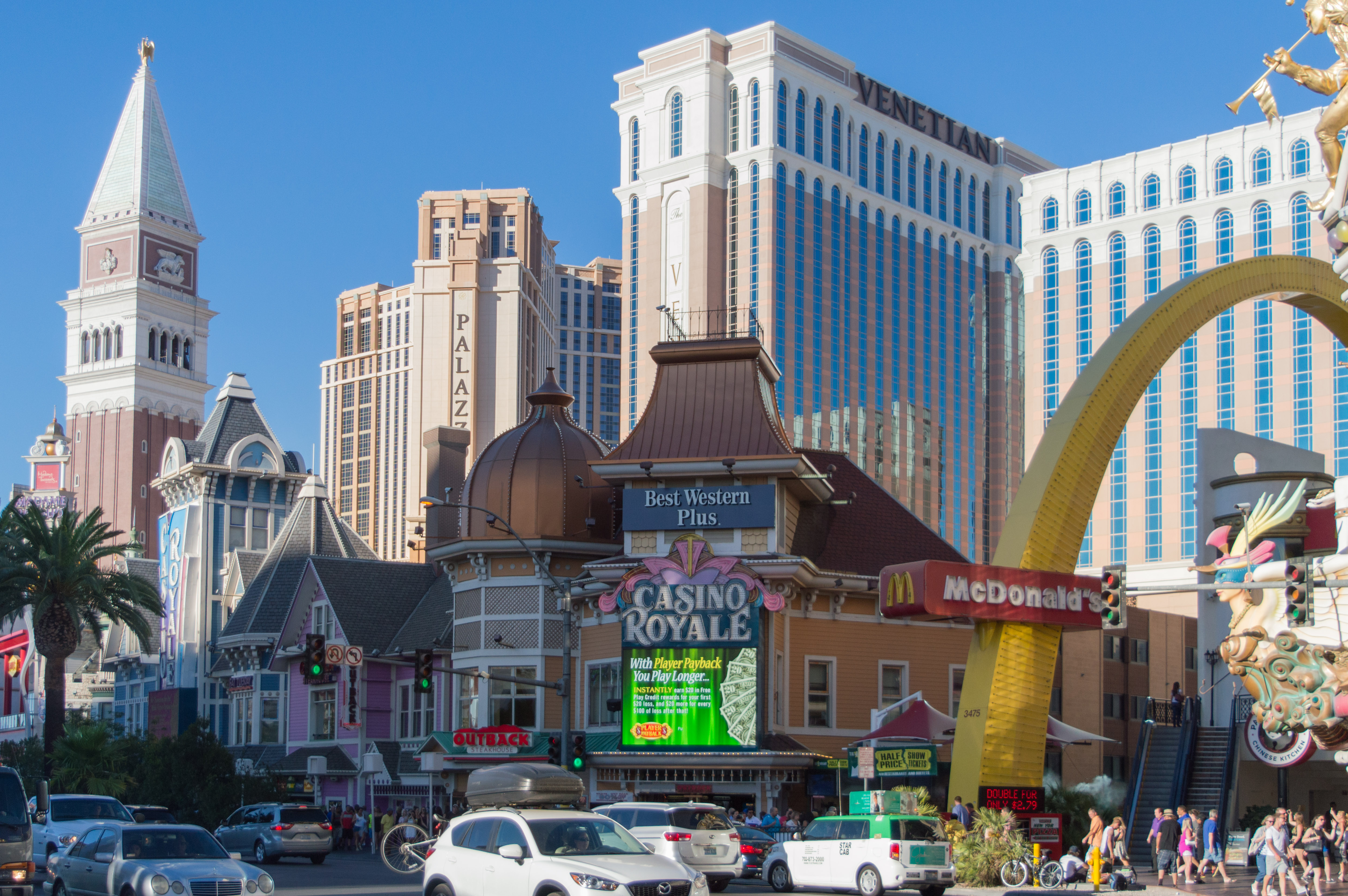 Casino Royale's low Strip frontage, with The Venetian towers behind it, photographed in July 2015.