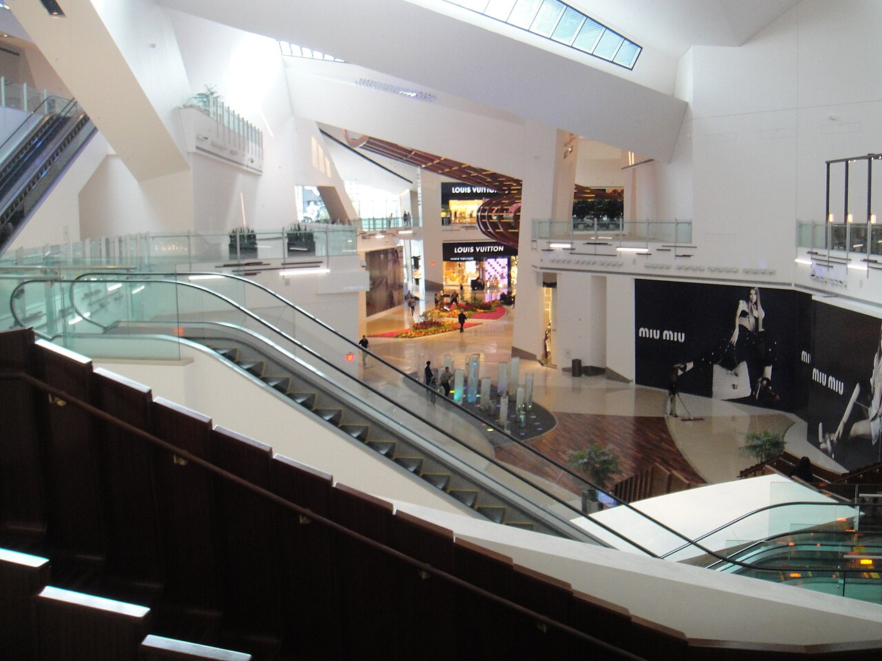 Crystals main shopping area and escalators, March 2010; historical interior.