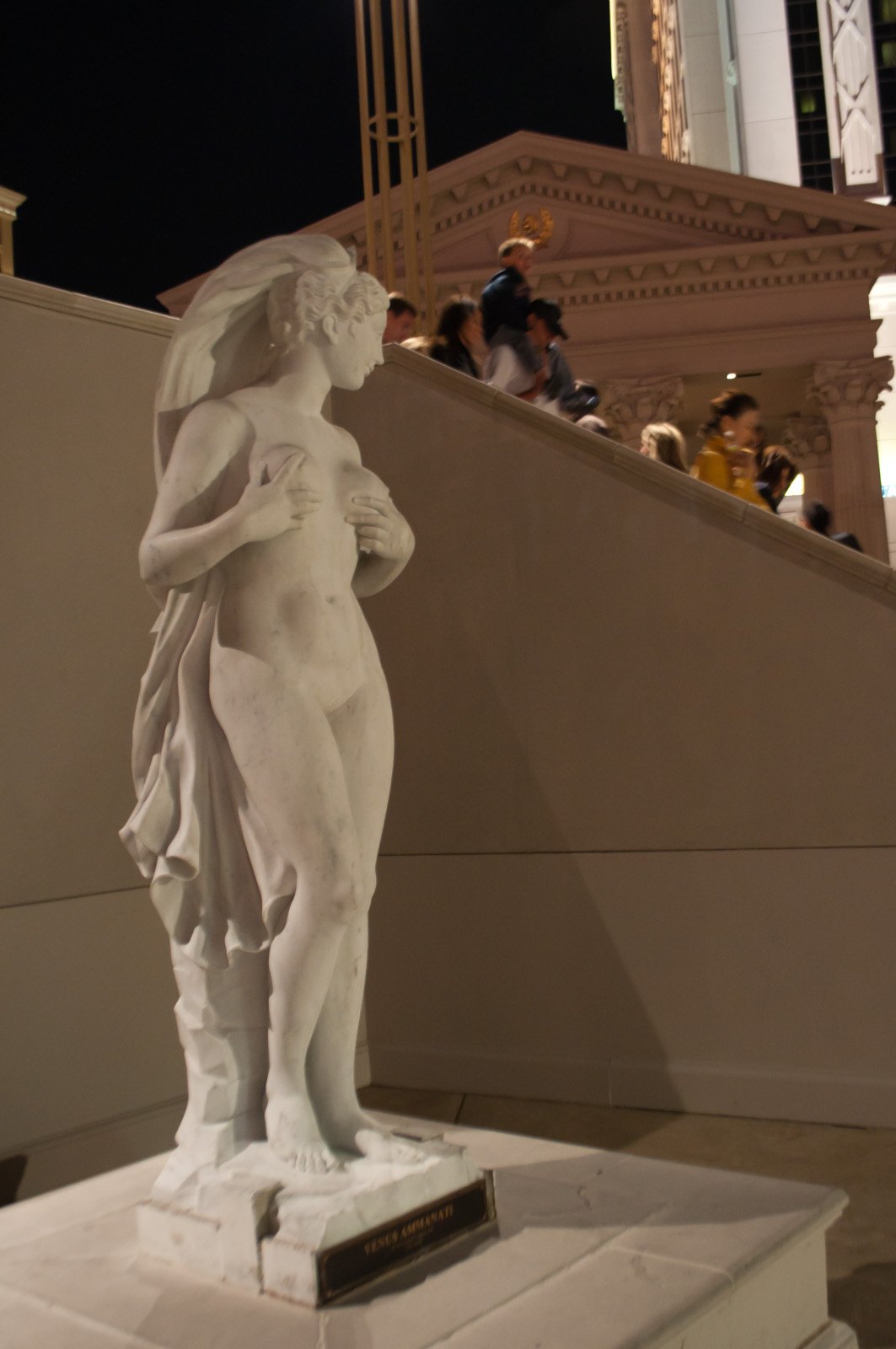 Aphrodite statue at Caesars Palace, photographed at night.