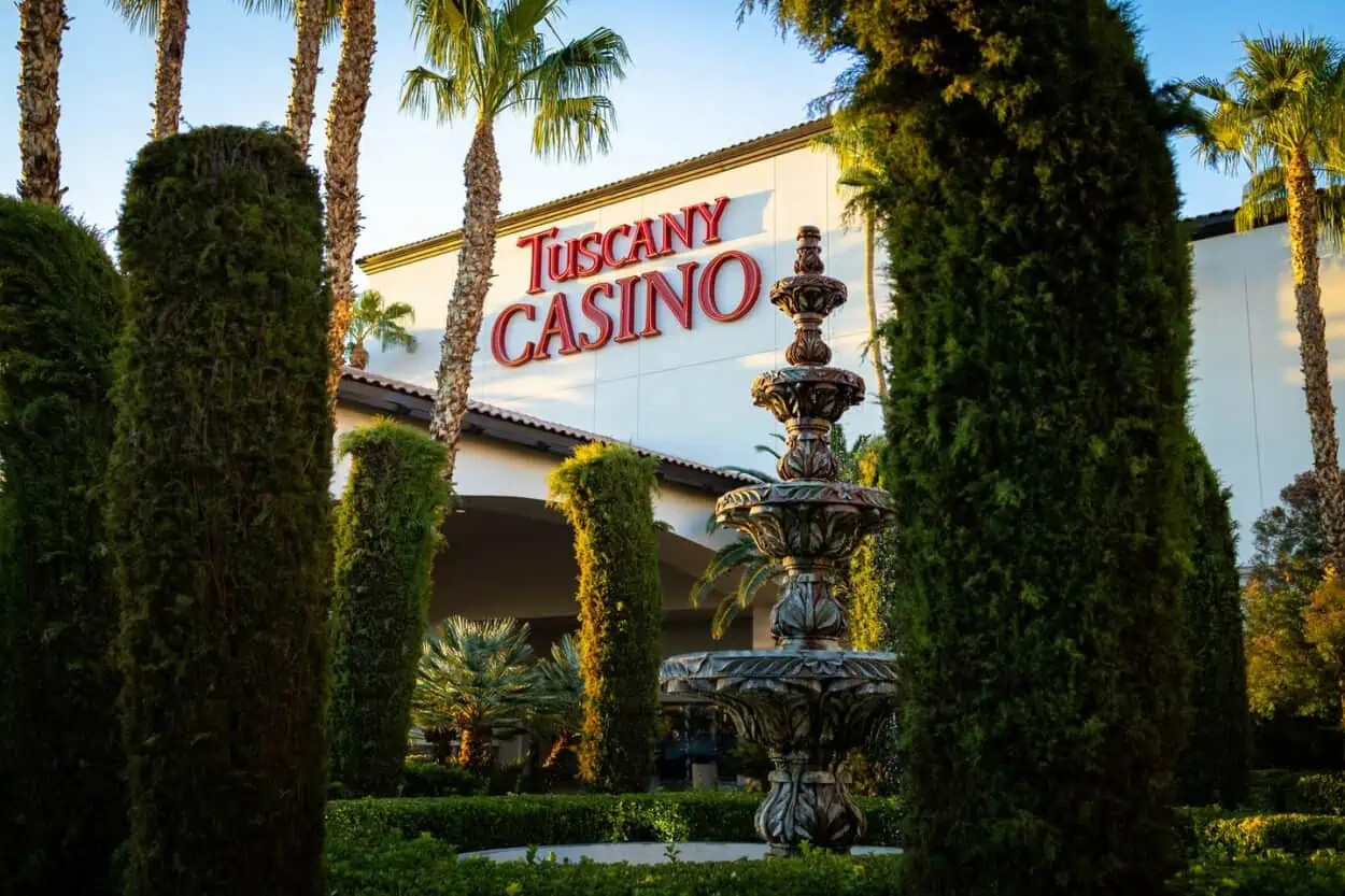 Tuscany Casino facade, fountain and landscaped entrance.