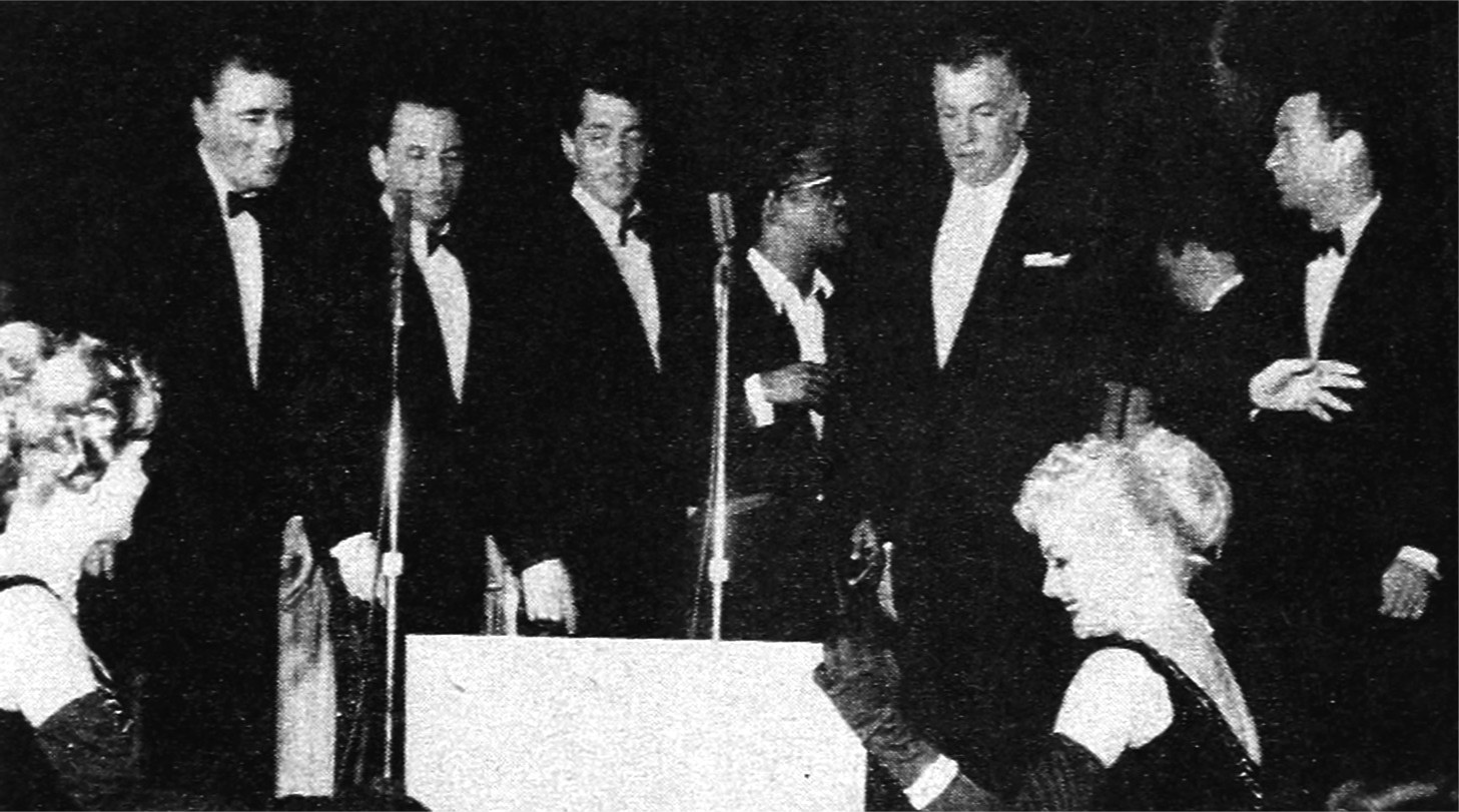 Six men at microphones at the Sands in May 1960: Rat Pack members with Jack Entratter.