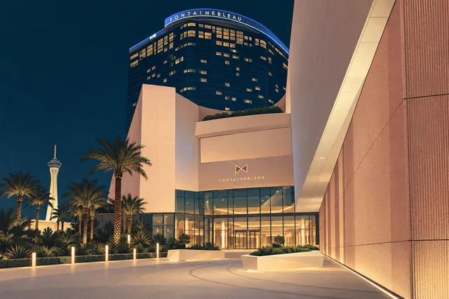 Architectural illustration of Fontainebleau’s curved blue tower and front entrance, with palms and simplified plaza.