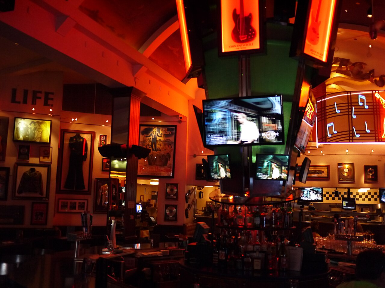 Memorabilia and screens in the Hard Rock Cafe.