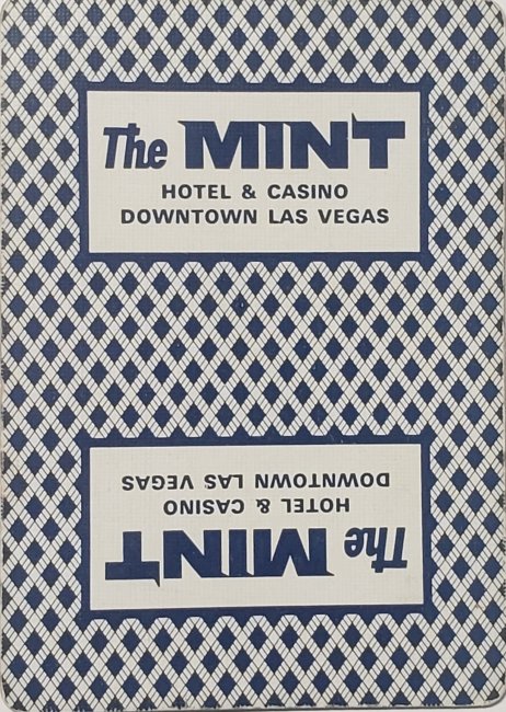 Blue-and-white patterned playing-card back reading The Mint Hotel and Casino, Downtown Las Vegas.