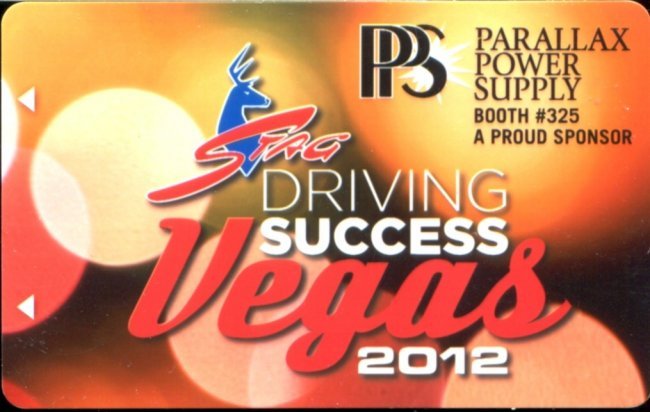 Orange and red 2012 Vegas event keycard advertising Parallax Power Supply at booth 325.