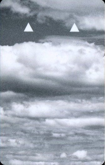 Front of a Skylofts at MGM Grand keycard, showing black-and-white clouds and two white arrows.