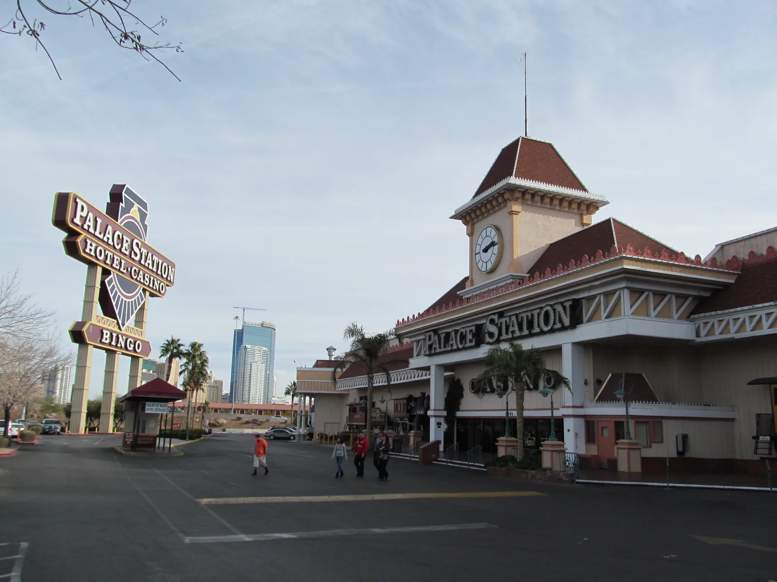 Palace Station’s earlier clock-tower facade, decorative locomotive shapes and tall roadside casino and bingo sign.